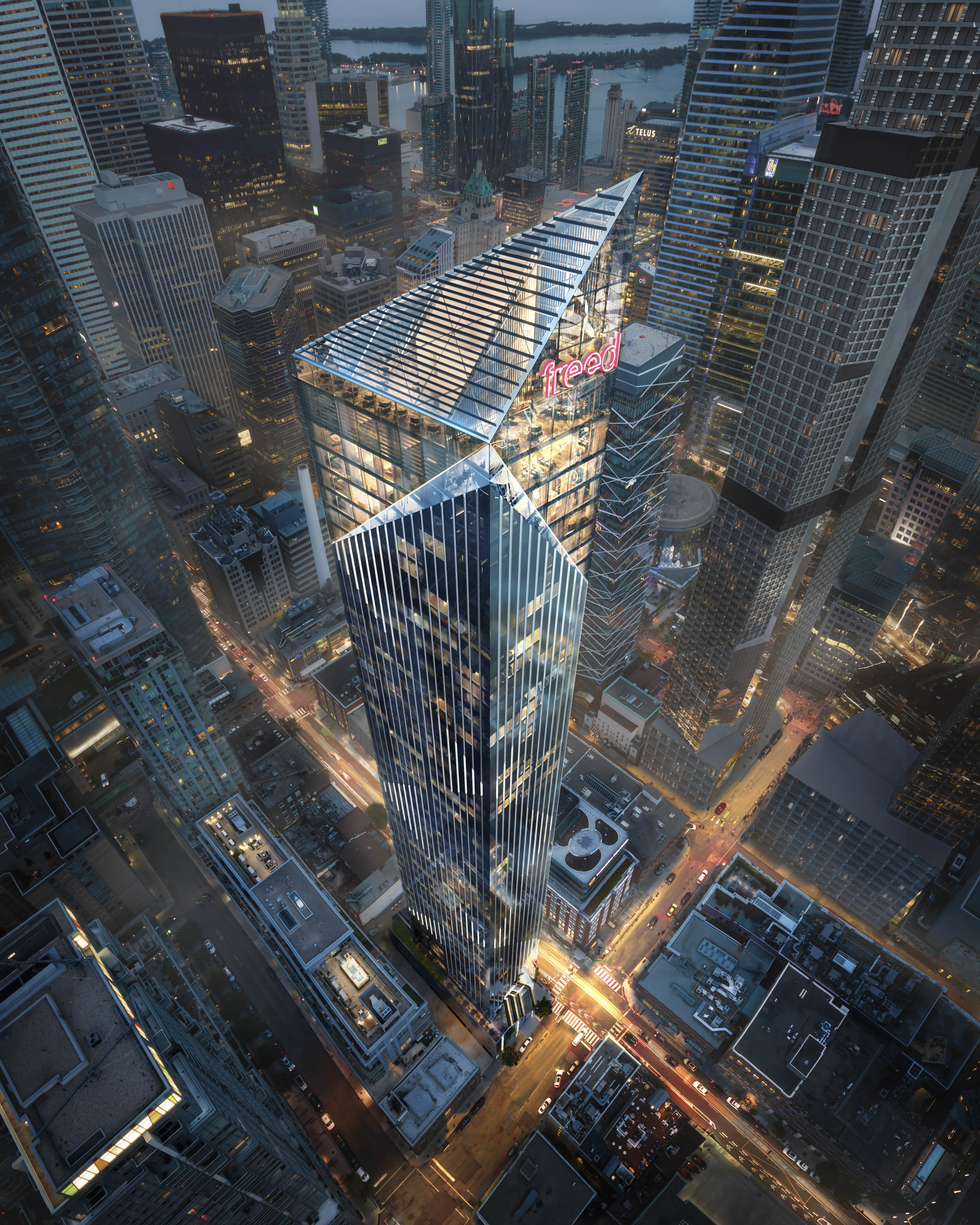 Dusk aerial of Freed Hotel within the Toronto skyline