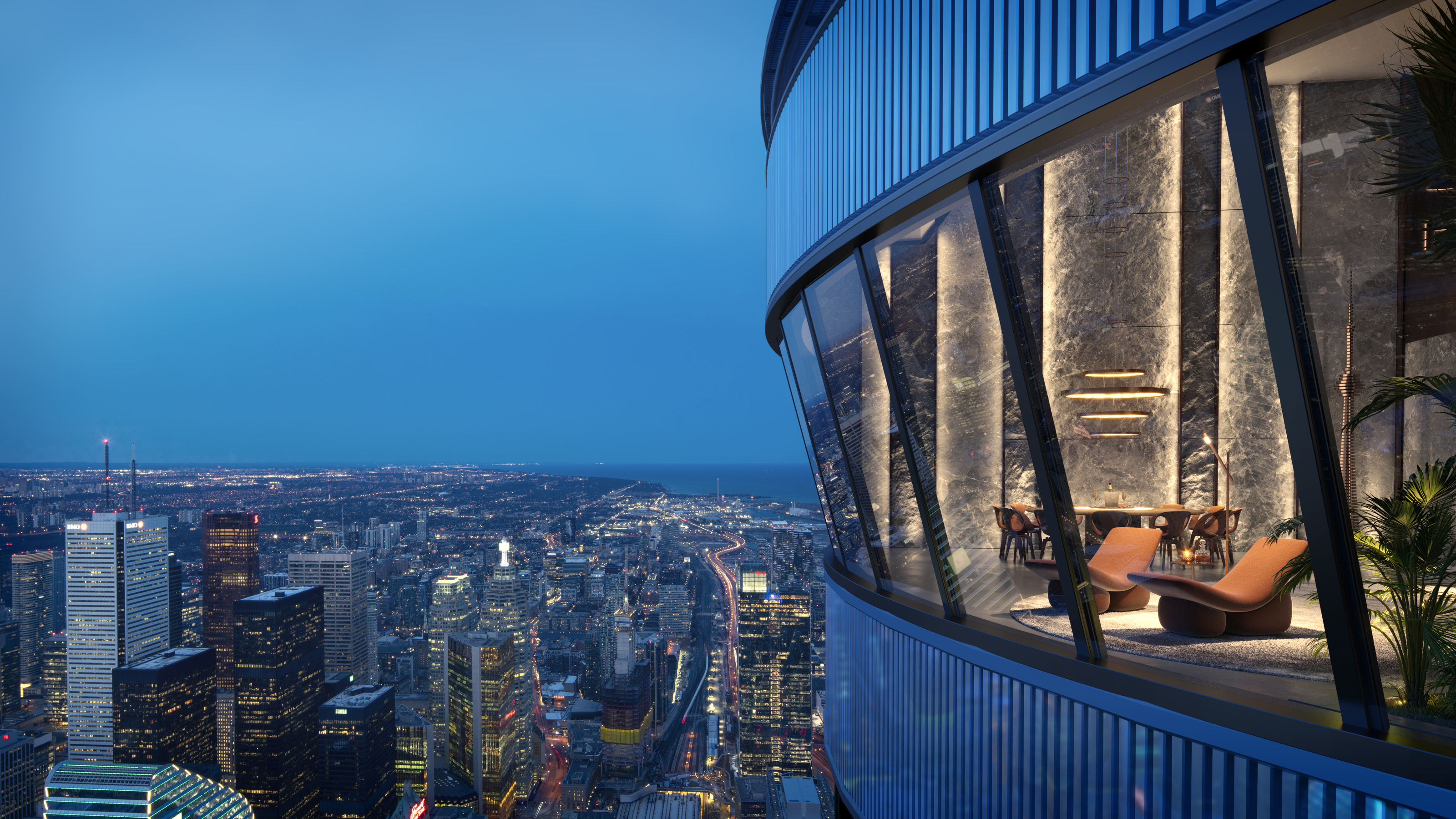 Curved glass tower overlooking Toronto at blue hour
